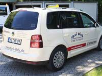 Taxibeklebung, Ansicht von schräg hinten